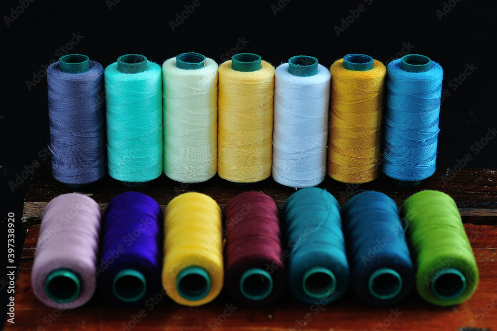various colors of sewing thread spools various colors of sewing thread spools