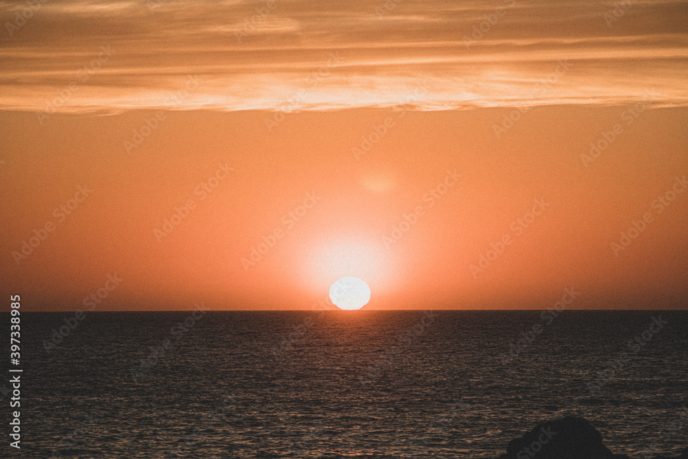 Sunset on the horizon of the sea