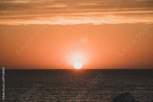 Sunset on the horizon of the sea