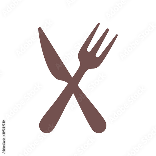 crossed knife and fork on white background