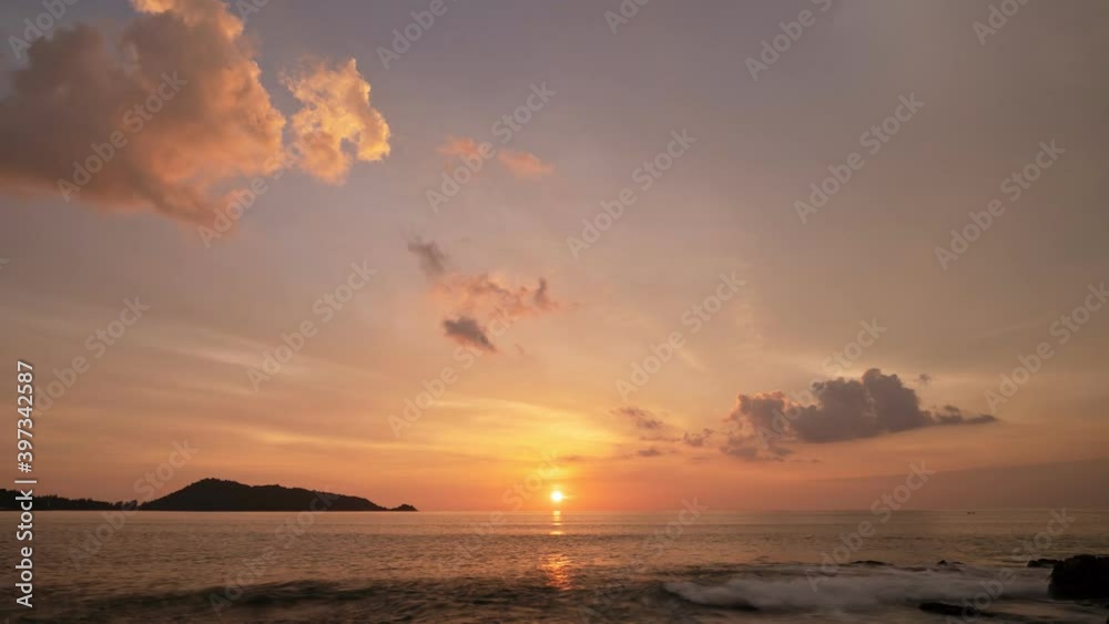 4K Timelapse of Amazing dramatic sunrise sky or sunset sky and clouds flowing over tropical sea Beautiful light nature in the sky 4K Timelapse of Amazing dramatic sunrise sky or sunset sky and clouds flowing over tropical sea Beautiful light nature in the sky