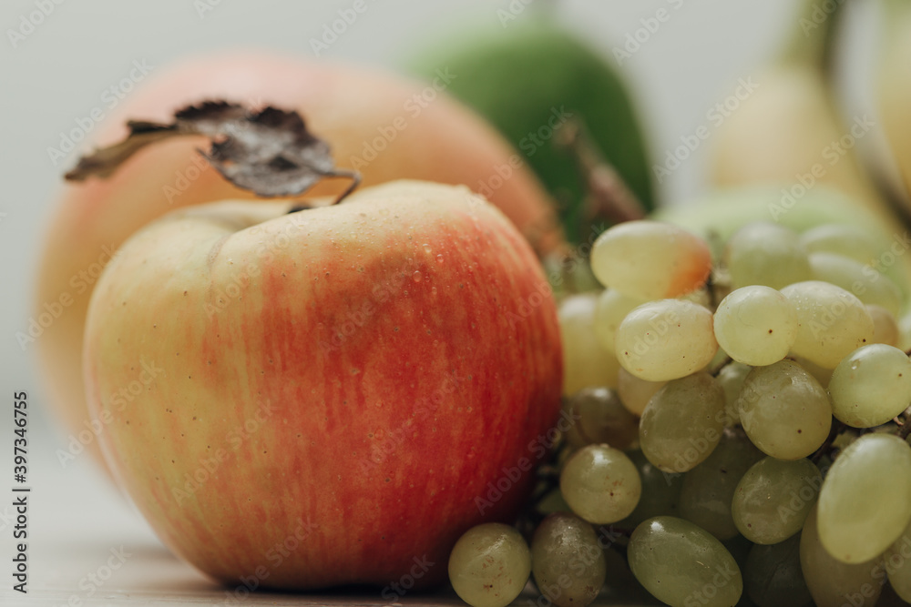 Composition with Summer Colorful Fresh Fruits on Wooden White Background Composition with Summer Colorful Fresh Fruits on Wooden White Background