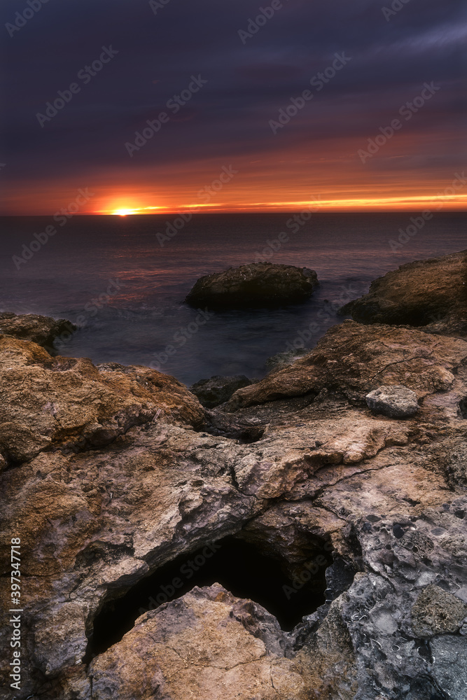 sunrise on rocky coast sunrise on rocky coast