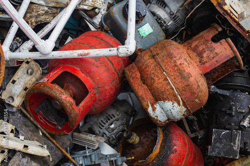 Scrap yard, metal for recycling, old gas cylinders.
