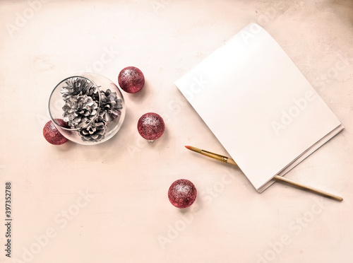 grunge style image with retro effect notepad and paintbrush and christmas decorations