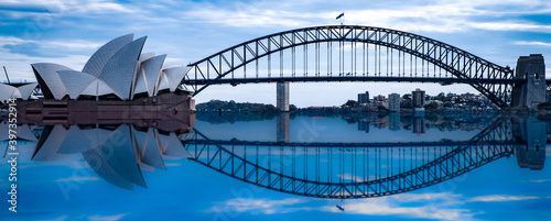 Sydney Harbour Bridge at night NSW Australia reflection in the harbour waters