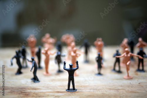 close up picture of toys depicting social unrest