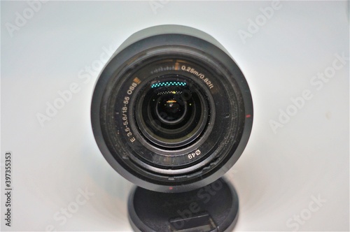 The lens for the camera on a dark background.