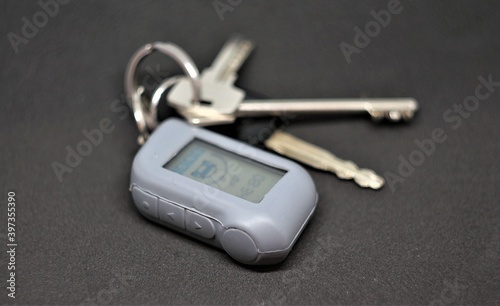 Car alarm key ring with keys.