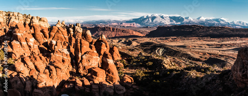 Fins of The Fiery Furnace and The Snow Capped La Sal Mountains, Arches National Park, Utah, USA photo