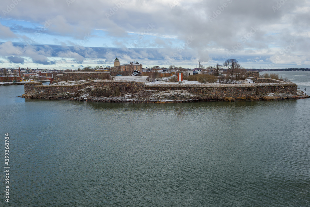 View of the ancient fortress Suomenlinna on a cloudy March day. Helsinki, Finland