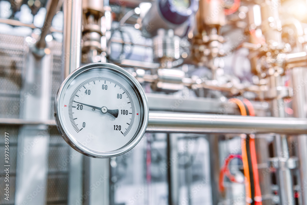 Pressure gauges mounted on the pipeline. Stock Photo | Adobe Stock