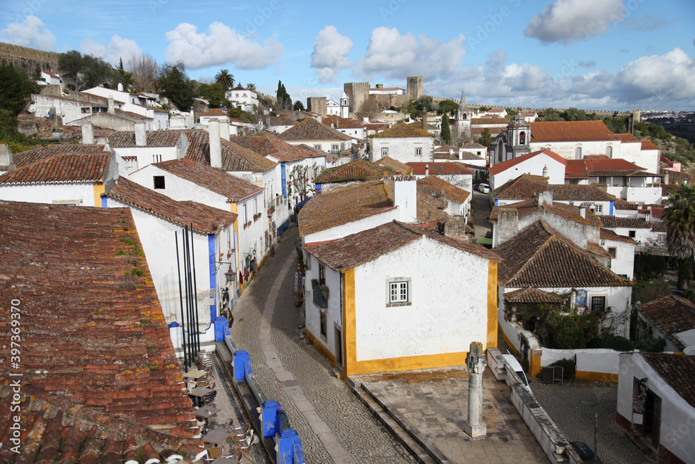 Bright street in Obidos. Portugal. Horizontal shot