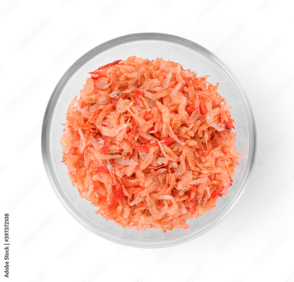Dried small shrimp in glass bowl isolated on white background. Dried small shrimp in glass bowl isolated on white background.