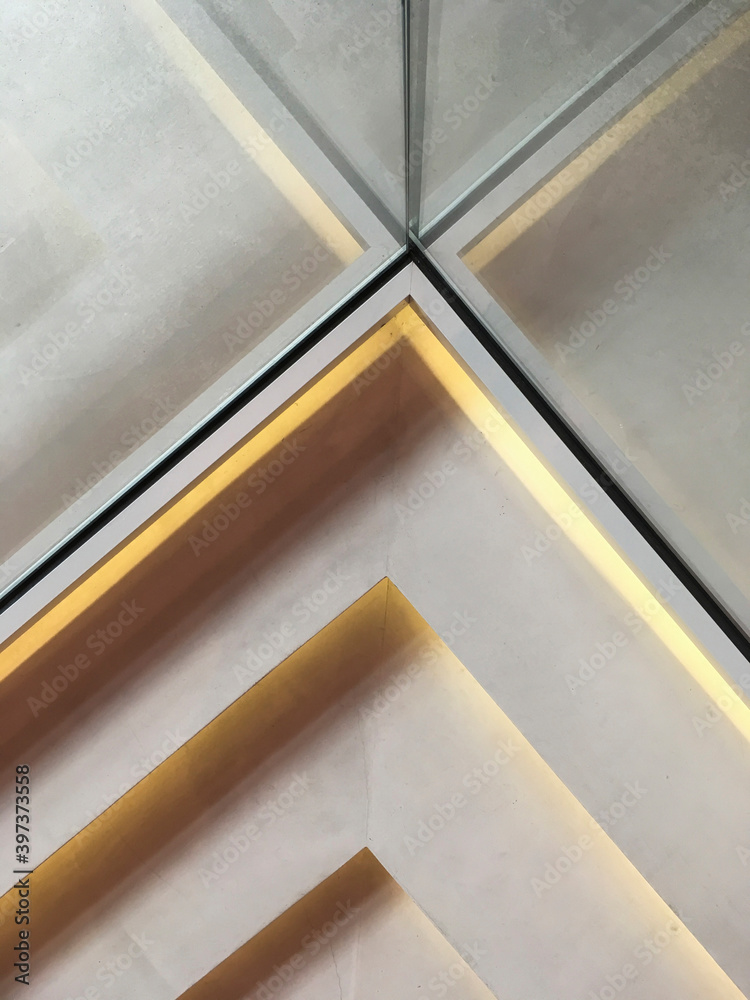Obraz premium Modern and stylish aluminum stairs with glass, lights and concrete floor, no person and space for text 