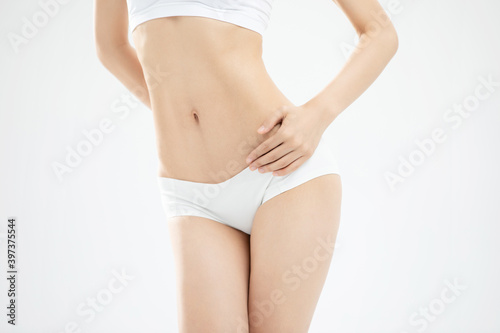 Closeup shot of beautiful sexy female body.diet and healthy lifestyle, weight loss concept © wijhatun