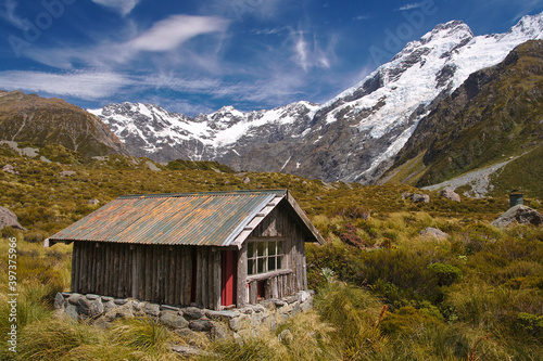 Shelter cabin in Hooker Valley with a snowy mountain view, Mount Cook National Park, New Zealand