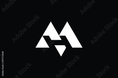 HM logo letter design on luxury background. MH logo monogram initials letter concept. HM icon logo design. MH elegant and Professional letter icon design on black background. M H HM HM