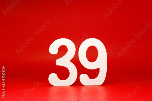 No 39 ( thirty nine ) Isolated red Background with Copy Space - Number 39% Percentage or Promotion - Discount or anniversary concept 