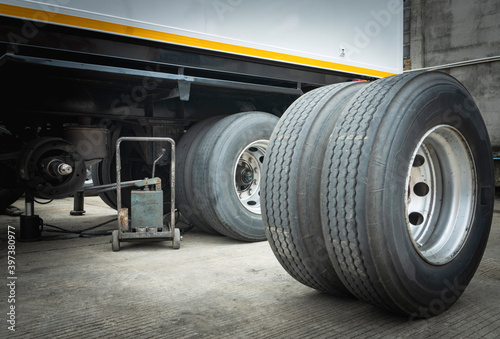 Truck spare wheels tires waiting for to change. trailer wheel maintenance. © Siwakorn1933
