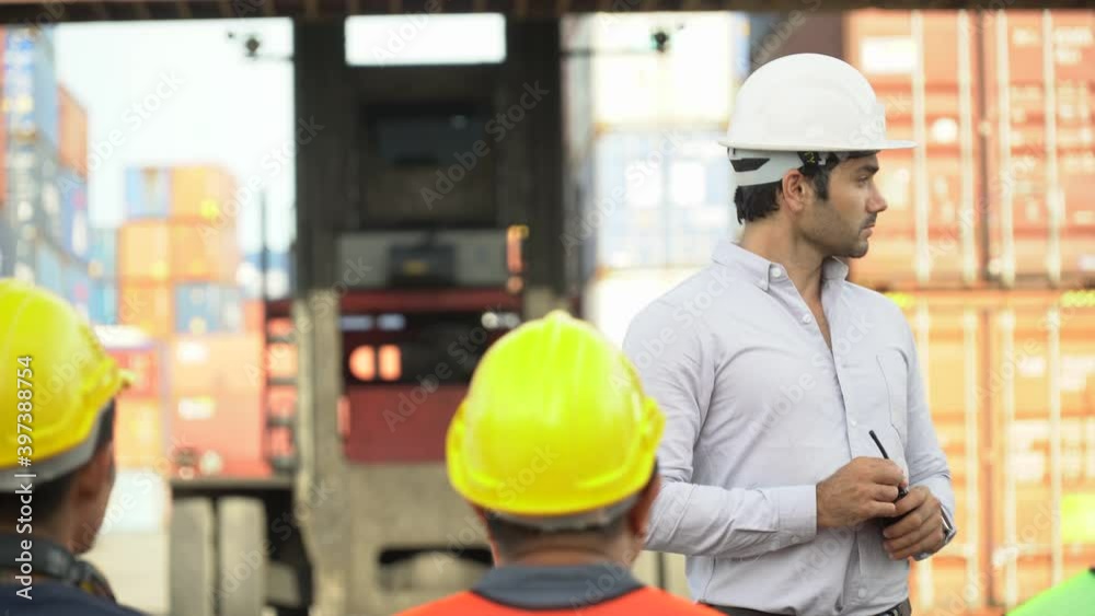 foreman training worker in morning meeting before entering start working in industrial container cargo outdoors foreman training worker in morning meeting before entering start working in industrial container cargo outdoors