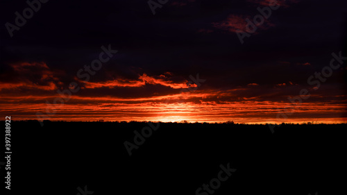 sunset in summer evening with clouds