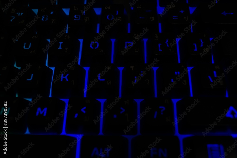 Back lighted computer gaming keyboard with versatile color schemes