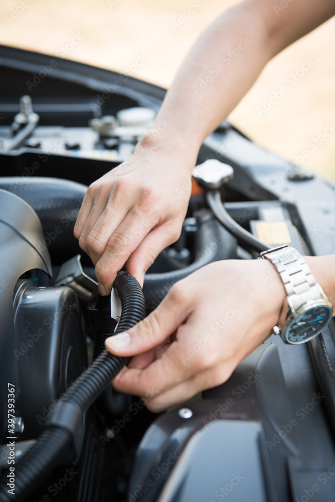 Auto mechanic checking car engine,worker,image of automobile mechanic repairing car 