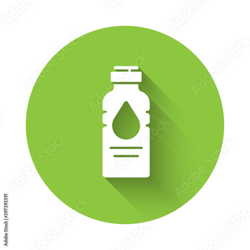 White Bottle of water icon isolated with long shadow. Soda aqua drink sign. Green circle button. Vector Illustration.