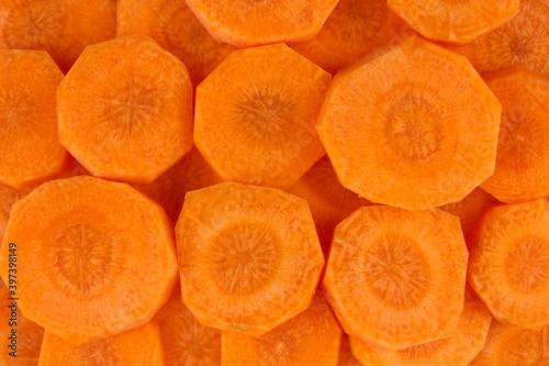 Background of sliced orange carrots