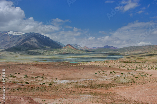 Scenic colorful mountain desert landscape along Pamir Highway near high-altitude Kyzyl Art pass, Gorno-Badakshan, Tajikistan
