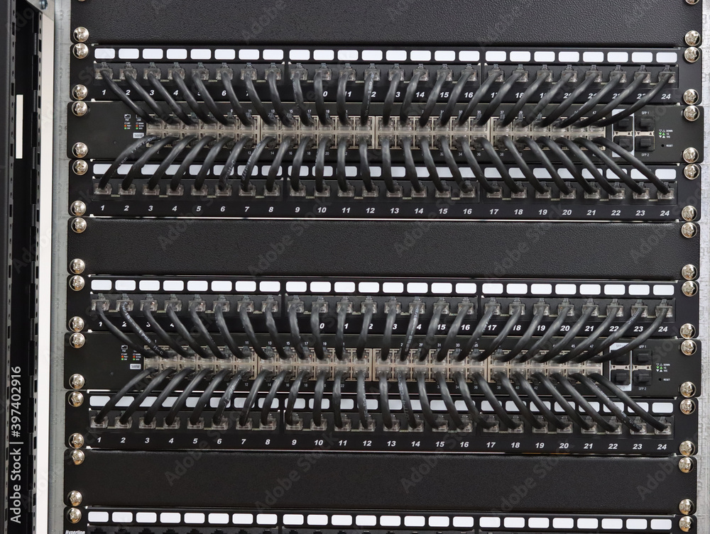 Connecting an Ethernet switch using patch cords with RJ45 connectors for data transmission in the data center.