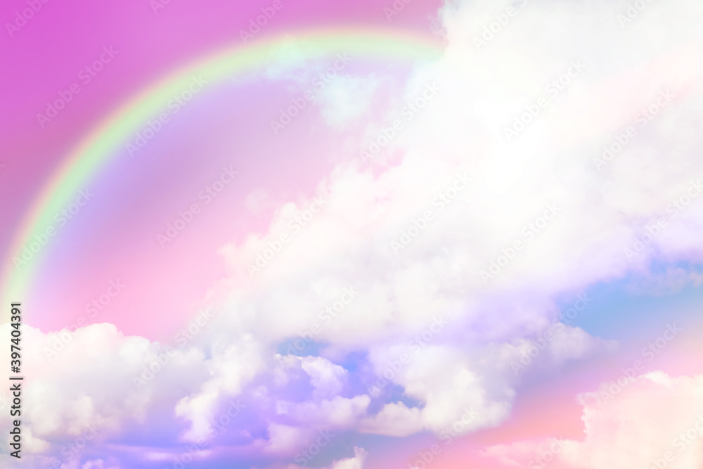 Amazing sky with rainbow and fluffy clouds, toned in unicorn colors Amazing sky with rainbow and fluffy clouds, toned in unicorn colors