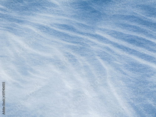Shadows and patterns on the surface of snow
