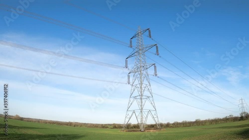 Electricity pylon in a field with blue sky. Bishop's Stortford, Hertfordshire. UK