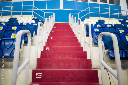 locked chairs at the stadium during the pandemic keep your distance don't sit here
