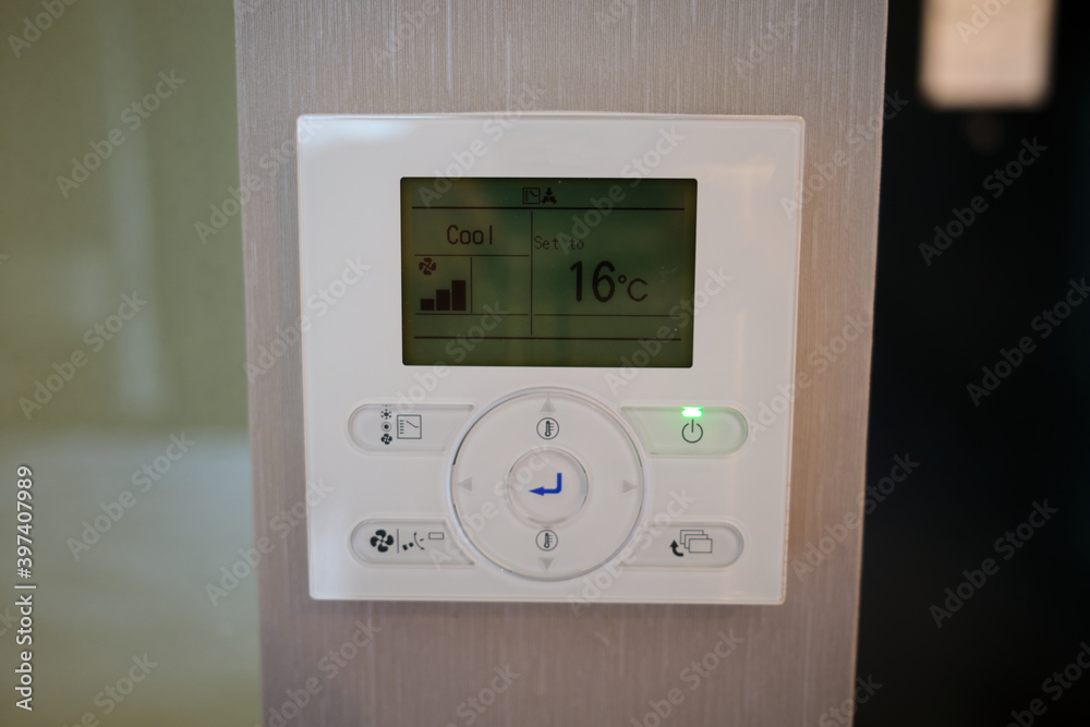 Digital air conditioning temperature controller at the wall Digital air conditioning temperature controller at the wall