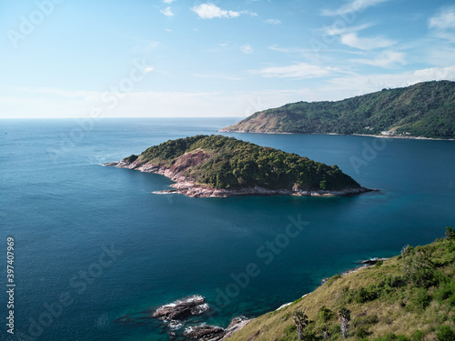 Beautiful landscape with ocean shore, small green island. Phuket, Thailand. Aerial drone view.