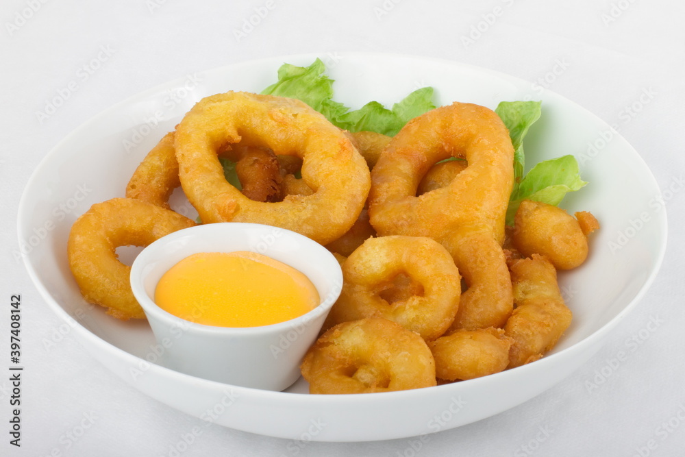 Tempura squid rings with cheese sauce Tempura squid rings with cheese sauce
