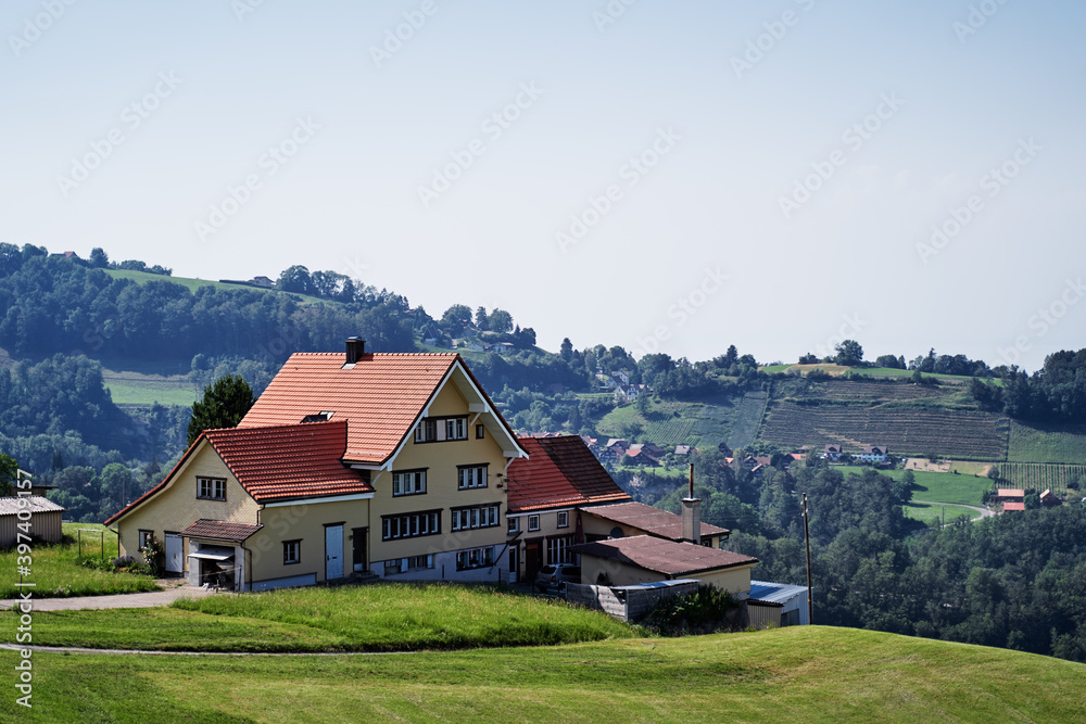Alpine mountains landscape. Traditional farm house with wonderfull view.