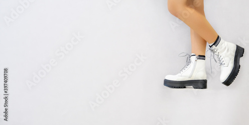 white shoes on a light background in the studio. close-up fashion shoes new collection fashion photography