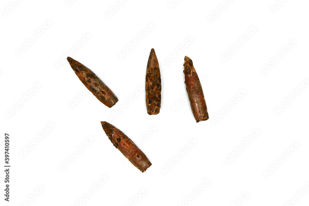 old rusty bullets on white background old rusty bullets on white background