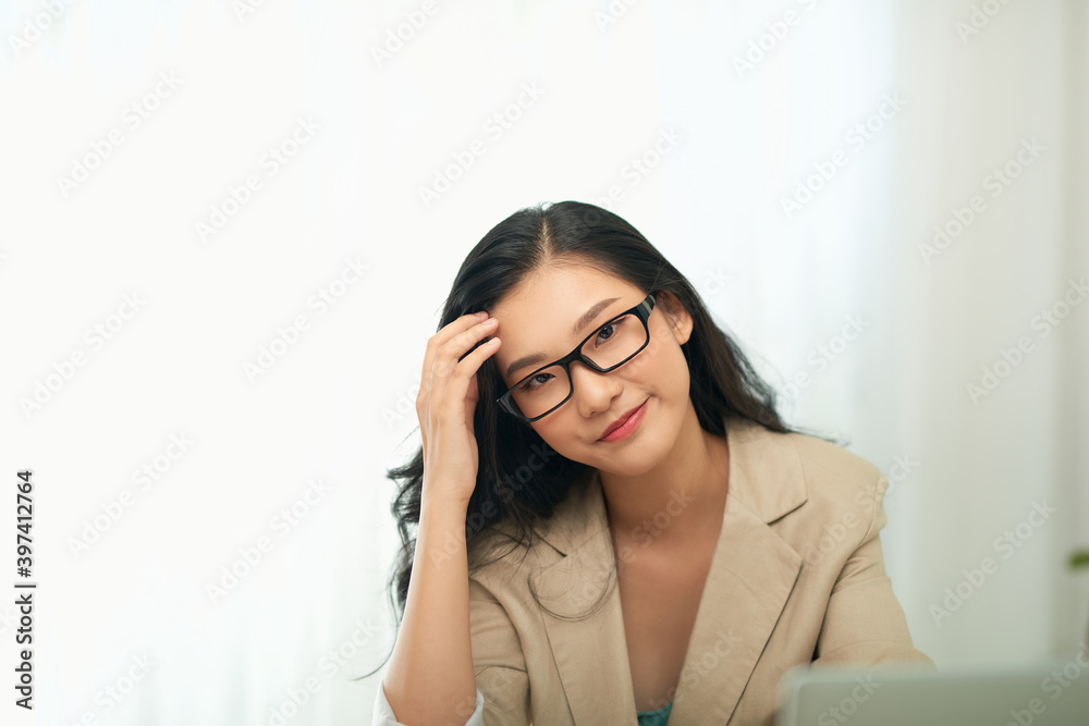 Successful business woman working at the office Successful business woman working at the office