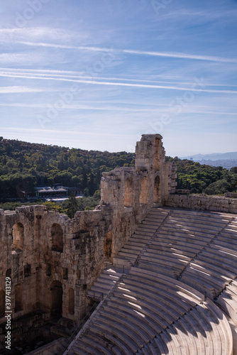 Ancient Odeon of Herodes Atticus theater - amphitheater of Acropolis of Athens, Greece.Landmark of Greece. Scenic view of Ancient Greek ruins overlooking Athens city.