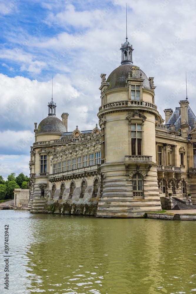 Architectural fragments of famous Chateau de Chantilly (Chantilly Castle, 1560) - a historic chateau located in town of Chantilly, Oise, Picardie, France.
