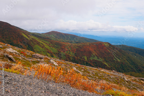 Overlooking autumnal mountains from above timber line (Tochigi, Japan) photo