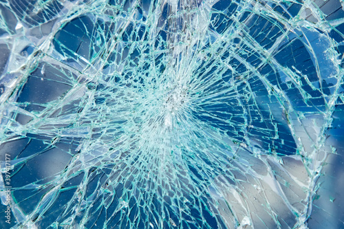 Fototapeta Naklejka Na Ścianę i Meble -  Broken glass texture, window cracks