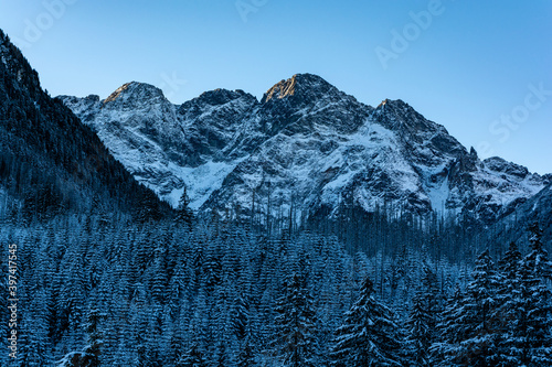 View from the north on the early winter landscape on Mieguszowiecki Summits. They are a group of three major summits in the main ridge of the Tatra Mountains on the border between Poland and Slovakia.