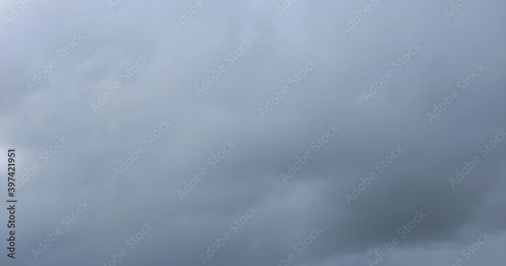 Timelapse of a cloudscape, showing dark clouds between the lighter clouds on a rainy day in a forest in the mountains
Timelapse of a cloudscape, showing dark clouds between the lighter clouds on a rainy day in a forest in the mountains