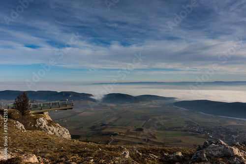 skywalk and beautiful landscape with clouds at the sky